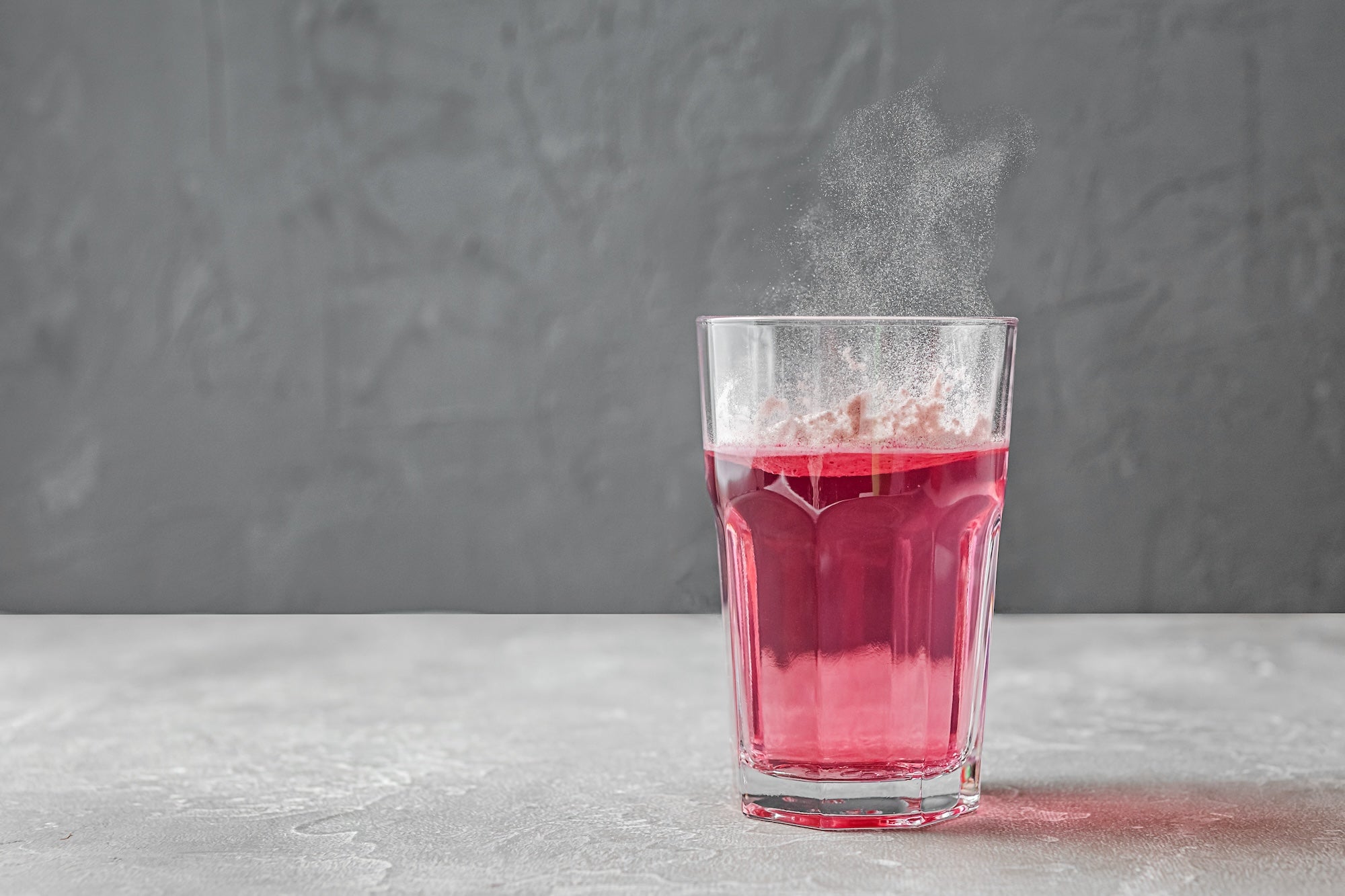 Ein Glas mit VitaMoment Daily Flavour