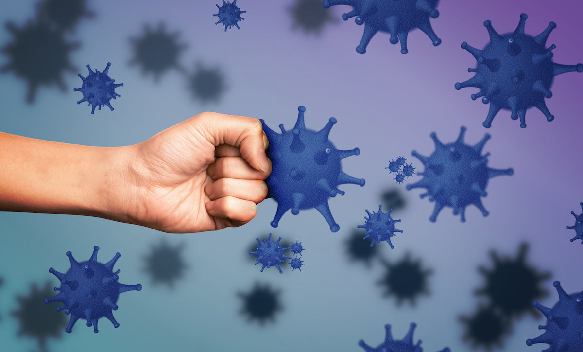 Immunabwehr: Hand hält Viren zurück